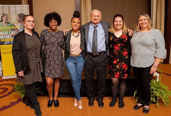 NFP Program graduates who are now Parent Ambassadors pose with Dr. David Olds.