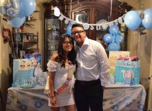 Photo of teen parents, Luisa and Marvin, at their baby shower. 