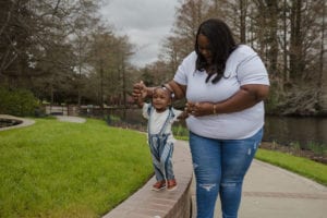 Shaquilla walking with daughter, Aubree